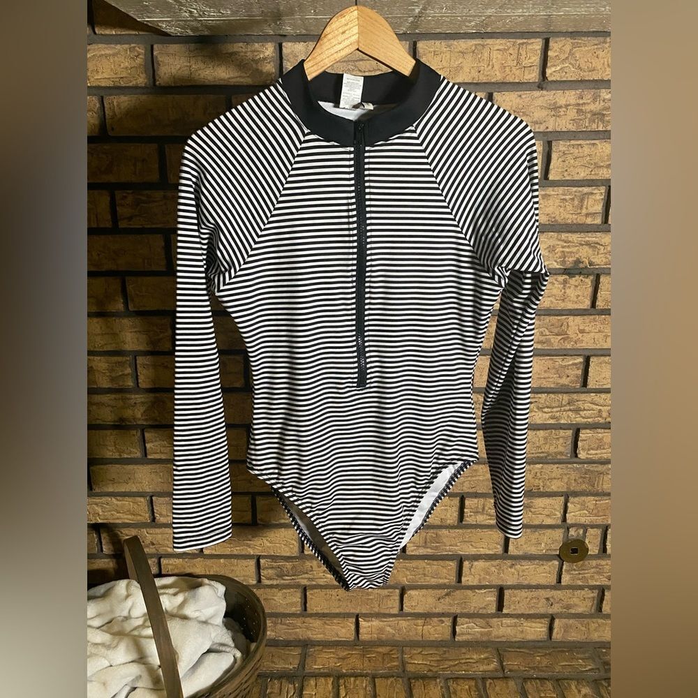 Black and white striped body suit